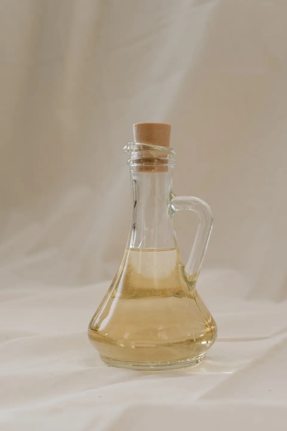 Glass cruet filled with oil