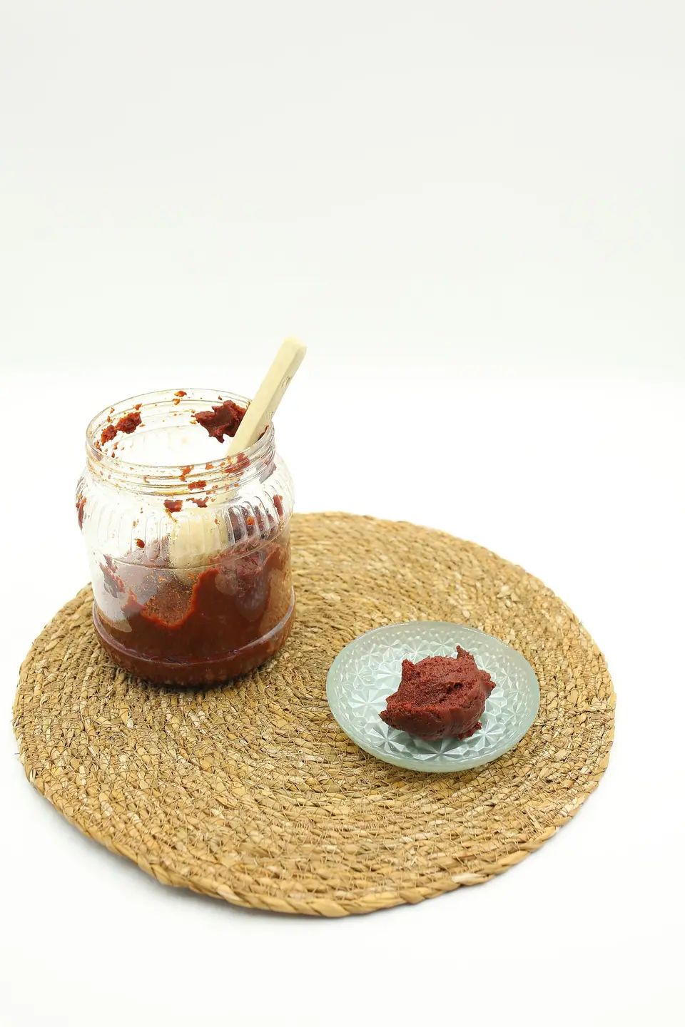 Red paste in a jar and a small dish
